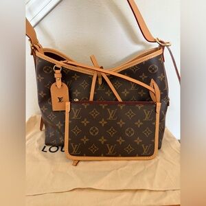Louis Vuitton CarryAll PM bag.